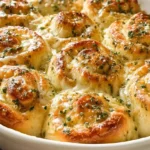 Soft fluffy Cheesy Garlic Rolls with melted mozzarella cheddar parmesan garlic butter herbs and golden brown pull-apart swirl tops