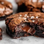 Fudgy Chewy Browkies with rich dark chocolate brownie layer chewy chocolate chip cookie layer melted chocolate chunks and flaky sea salt